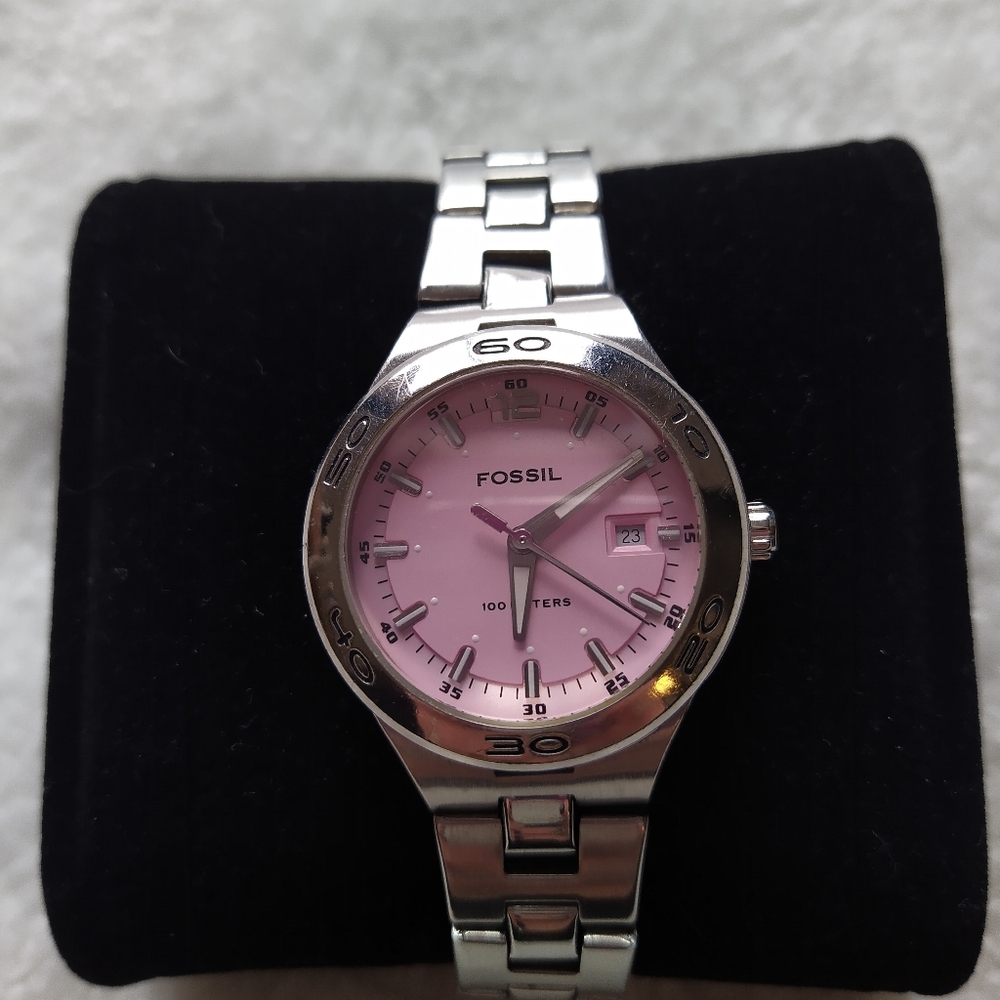 Women's FOSSIL watch.